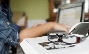 woman working on laptop at desk