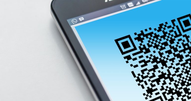 Mobile phone with QR code on the screen