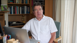 Dr Steve Jenkins at his home study delivering an acceptance speech for his ASC Hall of Fame Award