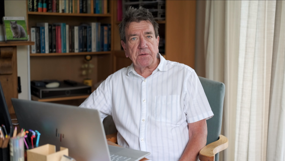 Dr Steve Jenkins at his home study delivering an acceptance speech for his ASC Hall of Fame Award