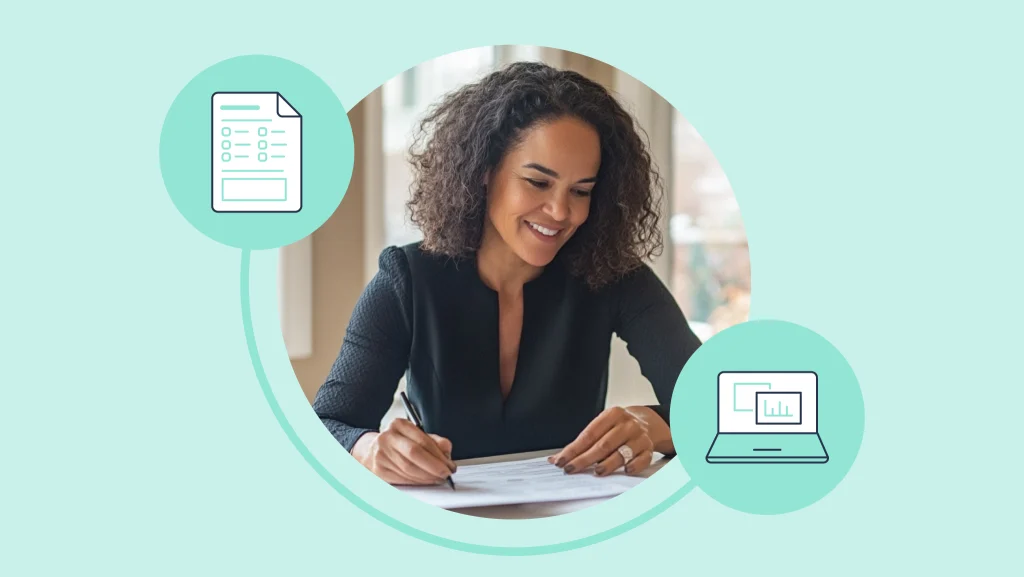 Woman completing a paper survey